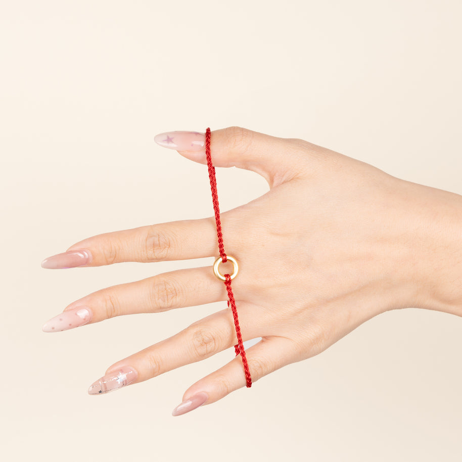 平安扣细红绳编织手链 / Ping An Kou Thin Red String Braided Bracelet — on-hand image 1