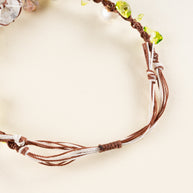 Daisy Chain — detail of the adjustable braided cord and sliding knot